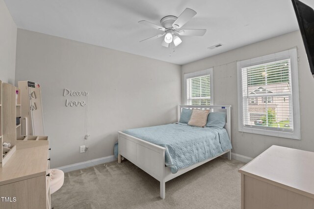 55 Prospectus Ln, Franklinton, NC 27525 - bedroom with light colored carpet, baseboards, and a ceiling fan