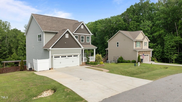 55 Prospectus Ln, Franklinton, NC 27525 - craftsman house with a garage, driveway, roof with shingles, and board and batten siding