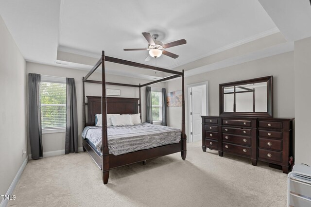 55 Prospectus Ln, Franklinton, NC 27525 - bedroom featuring light colored carpet, a tray ceiling, baseboards, crown molding, and ceiling fan