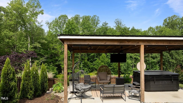 55 Prospectus Ln, Franklinton, NC 27525 - view of patio featuring a hot tub and fence