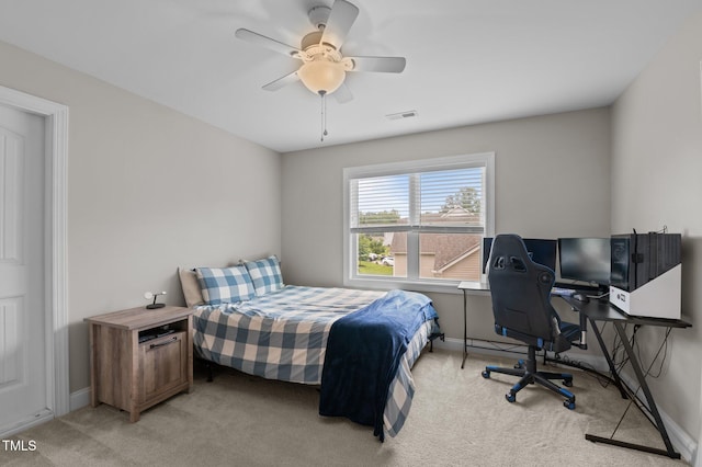 55 Prospectus Ln, Franklinton, NC 27525 - carpeted bedroom with baseboards, ceiling fan, and an office area