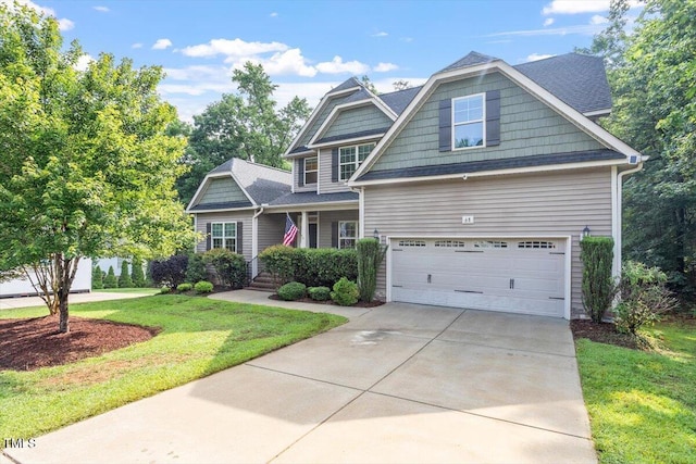 68 Tanners Way, Clayton, NC 27527 - view of front facade with a front lawn, concrete driveway, a garage, and a porch