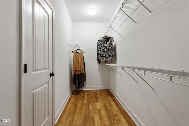 68 Tanners Way, Clayton, NC 27527 - spacious closet featuring light wood-type flooring