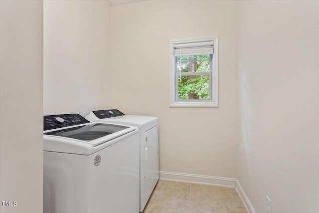 68 Tanners Way, Clayton, NC 27527 - washroom featuring washer and dryer and baseboards