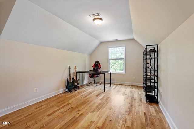 68 Tanners Way, Clayton, NC 27527 - office area featuring light wood-style flooring, vaulted ceiling, and baseboards