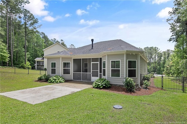 rear view of house with a sunroom