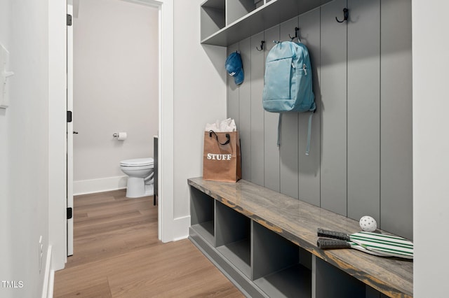 703 E Markham Ave, Durham, NC 27701 - mudroom featuring baseboards and light wood-style flooring