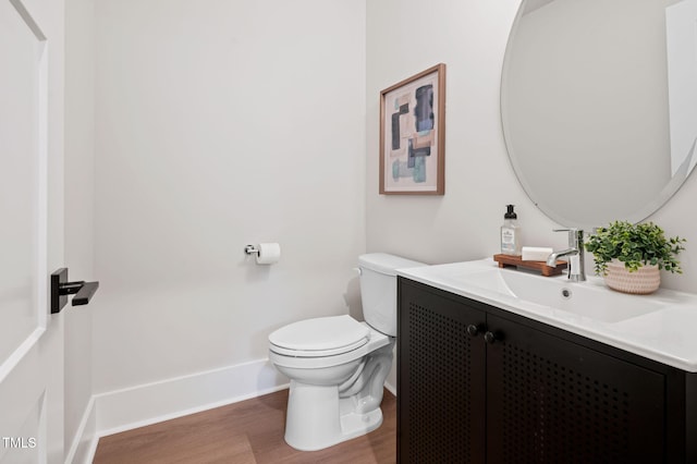 703 E Markham Ave, Durham, NC 27701 - bathroom with wood finished floors and vanity
