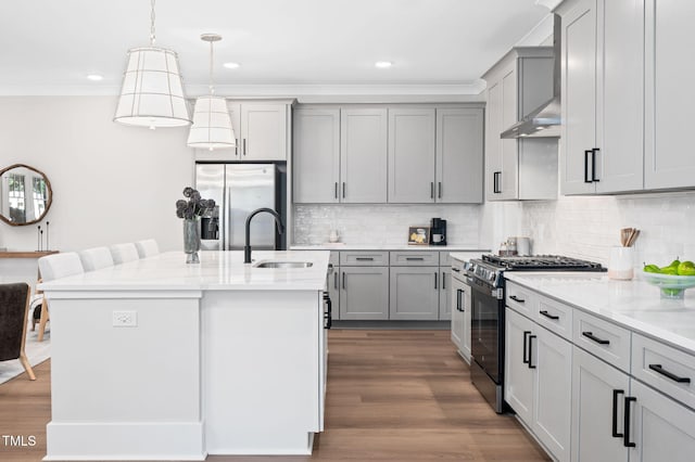 703 E Markham Ave, Durham, NC 27701 - kitchen with appliances with stainless steel finishes, wall chimney exhaust hood, gray cabinetry, recessed lighting, and crown molding