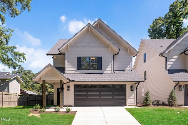 703 E Markham Ave, Durham, NC 27701 - view of front of property featuring a shingled roof, concrete driveway, and an attached garage