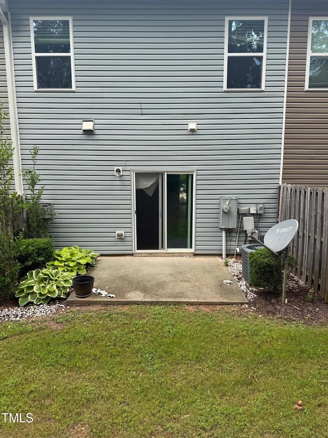 1671 Holly Grove Way, Durham, NC 27713 - back of house featuring a patio area