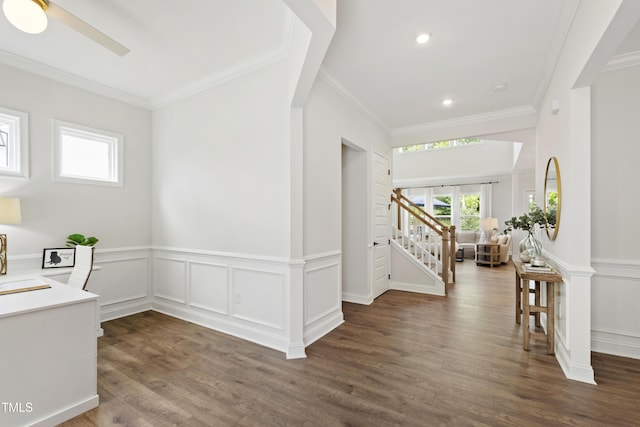 1928 Vandiver Way, Apex, NC 27523 - interior space with healthy amount of natural light, stairs, wood finished floors, crown molding, and a wainscoted wall