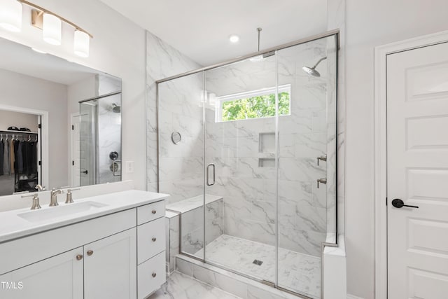 1928 Vandiver Way, Apex, NC 27523 - full bath featuring marble finish floors, a marble finish shower, vanity, and a walk in closet