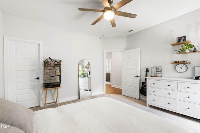 1928 Vandiver Way, Apex, NC 27523 - bedroom with light carpet, baseboards, and ceiling fan