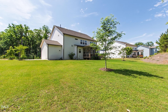 1928 Vandiver Way, Apex, NC 27523 - view of grassy yard featuring a sunroom