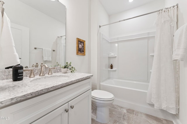 1625 Plover Cir, Fuquay Varina, NC 27526 - full bathroom featuring vanity, shower / bathtub combination with curtain, and stone finish floors