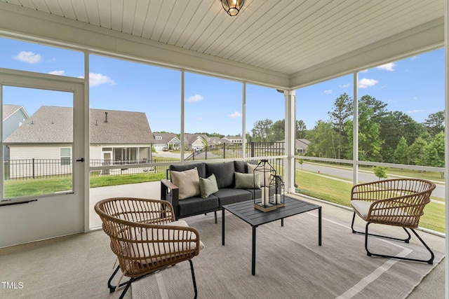 1625 Plover Cir, Fuquay Varina, NC 27526 - sunroom featuring an outdoor hangout area and a residential view