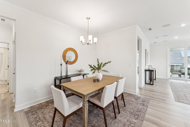 1625 Plover Cir, Fuquay Varina, NC 27526 - dining room featuring a chandelier, light wood-style flooring, ornamental molding, and recessed lighting