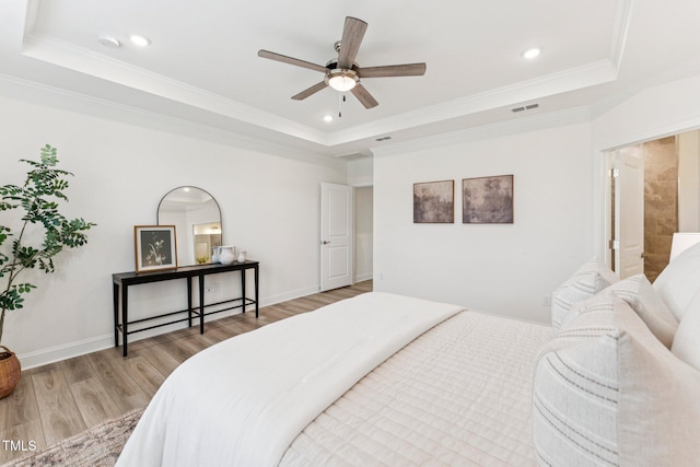 1625 Plover Cir, Fuquay Varina, NC 27526 - bedroom with a tray ceiling, light wood-style floors, ornamental molding, recessed lighting, and a ceiling fan