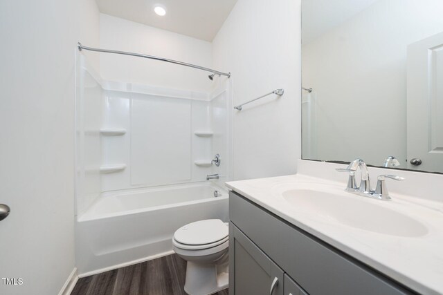 171 Piney Field Rd, Fuquay Varina, NC 27526 - full bath with vanity, toilet, wood finished floors, and shower / bathtub combination
