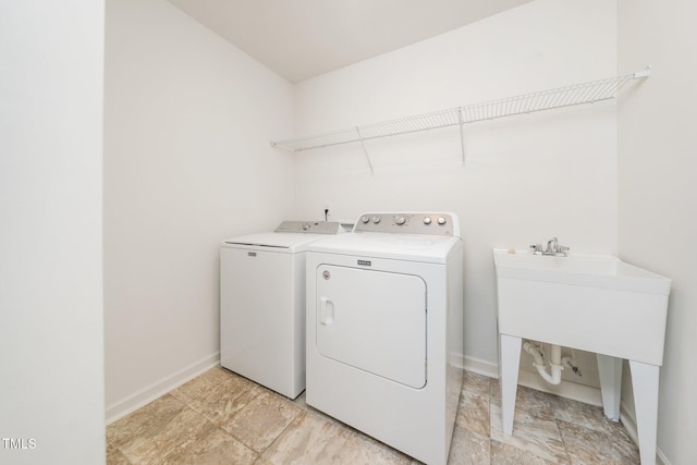 171 Piney Field Rd, Fuquay Varina, NC 27526 - washroom featuring washer and dryer and baseboards