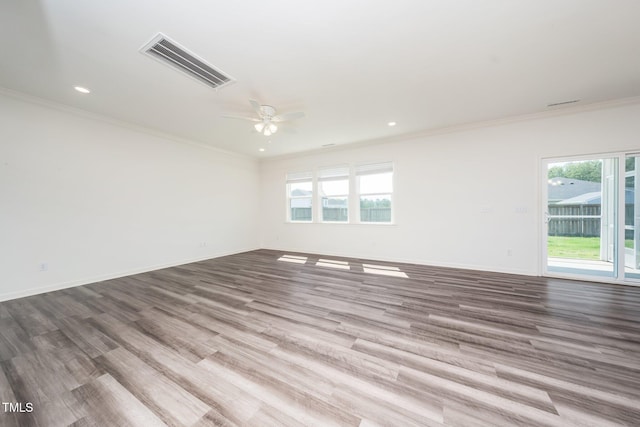 171 Piney Field Rd, Fuquay Varina, NC 27526 - unfurnished room with plenty of natural light, ornamental molding, ceiling fan, wood finished floors, and baseboards