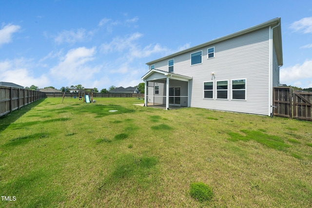 171 Piney Field Rd, Fuquay Varina, NC 27526 - back of house featuring a playground and a sunroom