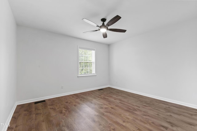 129 Assembly Ct, Cary, NC 27511 - spare room featuring ceiling fan, wood finished floors, and baseboards