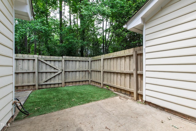 129 Assembly Ct, Cary, NC 27511 - view of yard featuring a patio