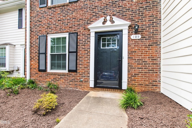 129 Assembly Ct, Cary, NC 27511 - entrance to property with brick siding