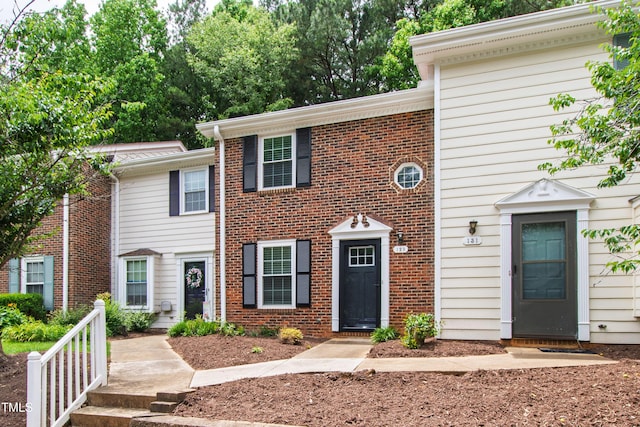 129 Assembly Ct, Cary, NC 27511 - view of property with brick siding