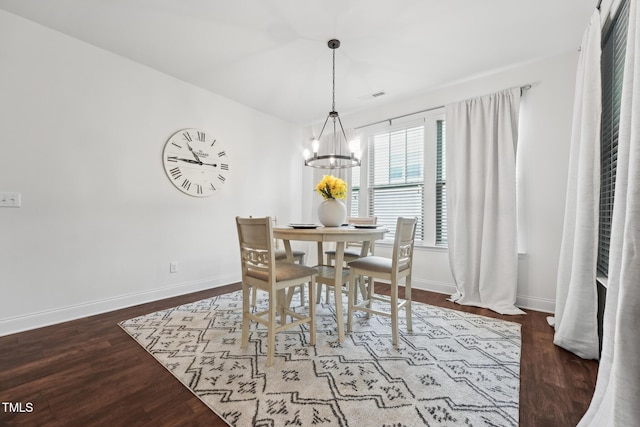 475 Long View Dr, Franklinton, NC 27525 - dining space featuring a chandelier, baseboards, and wood finished floors