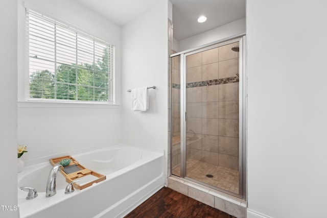 475 Long View Dr, Franklinton, NC 27525 - full bathroom with a garden tub, a stall shower, and wood finished floors