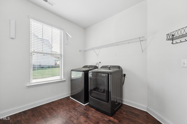 475 Long View Dr, Franklinton, NC 27525 - washroom with washer and clothes dryer, baseboards, and wood finished floors