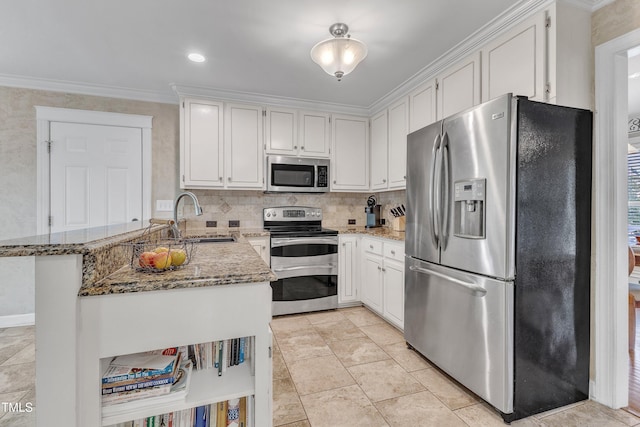 2721 Dahlgreen Rd, Raleigh, NC 27615 - kitchen featuring appliances with stainless steel finishes, a sink, light stone counters, a peninsula, and ornamental molding