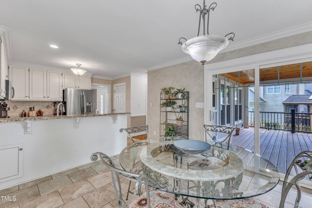 2721 Dahlgreen Rd, Raleigh, NC 27615 - dining area featuring ornamental molding