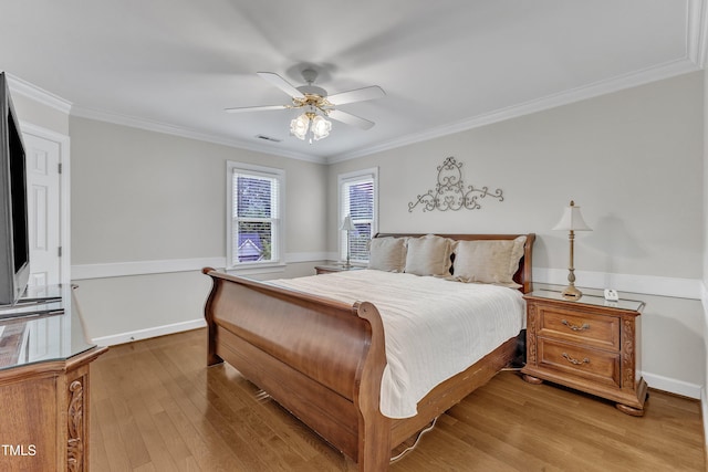 2721 Dahlgreen Rd, Raleigh, NC 27615 - bedroom with light wood-type flooring, ornamental molding, a ceiling fan, and baseboards