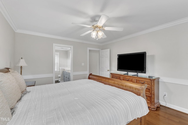 2721 Dahlgreen Rd, Raleigh, NC 27615 - bedroom featuring crown molding, wood finished floors, a ceiling fan, and ensuite bathroom