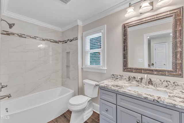 2721 Dahlgreen Rd, Raleigh, NC 27615 - full bath featuring ornamental molding, wood finished floors, toilet, vanity, and baseboards
