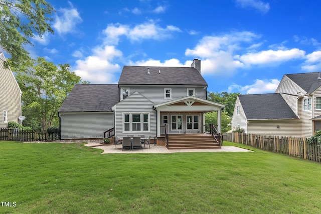 2721 Dahlgreen Rd, Raleigh, NC 27615 - back of house featuring a patio area, a chimney, entry steps, and a shingled roof