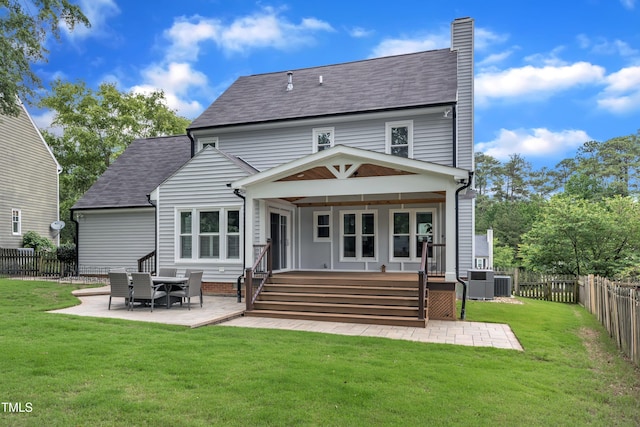 2721 Dahlgreen Rd, Raleigh, NC 27615 - rear view of property with a patio area, a chimney, and central air condition unit