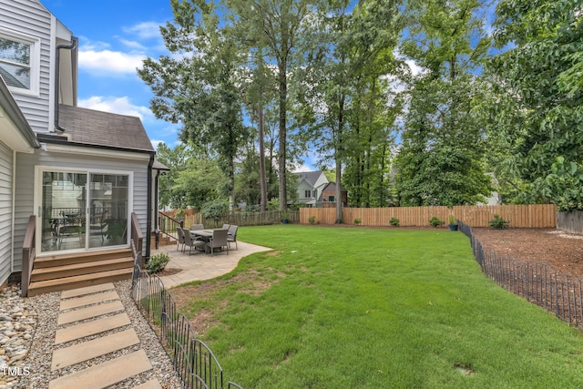 2721 Dahlgreen Rd, Raleigh, NC 27615 - view of yard featuring a patio area and entry steps