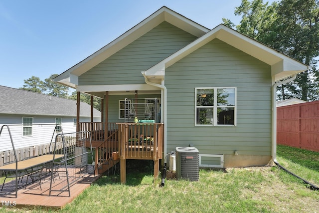 2620 Holloway St, Durham, NC 27703 - rear view of house with central AC unit and a deck