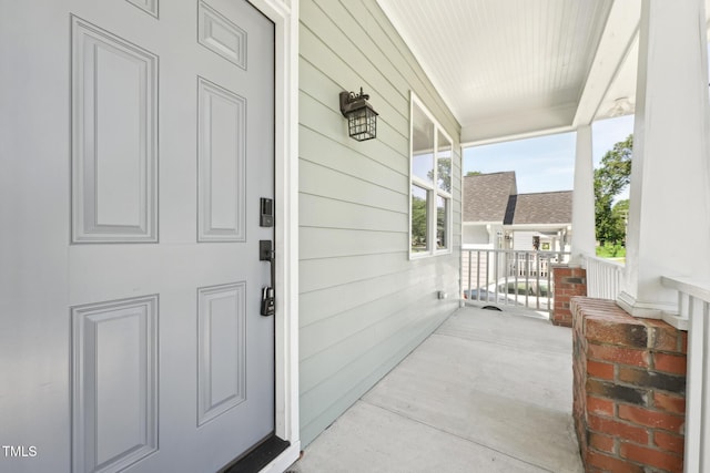 2620 Holloway St, Durham, NC 27703 - doorway to property featuring a porch