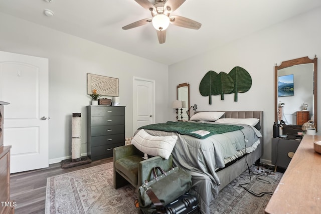 2620 Holloway St, Durham, NC 27703 - bedroom featuring wood finished floors, baseboards, and ceiling fan