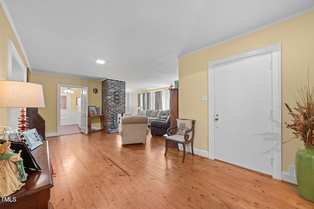 1605 Longview Ave, Tarboro, NC 27886 - living area featuring ornamental molding, light wood-type flooring, a ceiling fan, and baseboards