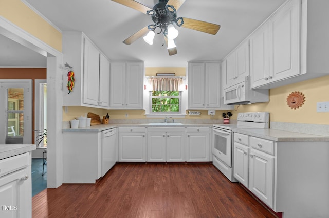 1605 Longview Ave, Tarboro, NC 27886 - kitchen featuring white appliances, white cabinetry, a ceiling fan, light countertops, and dark wood-style flooring