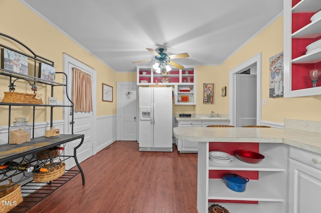1605 Longview Ave, Tarboro, NC 27886 - kitchen with open shelves, white fridge with ice dispenser, light countertops, ornamental molding, and dark wood-style flooring
