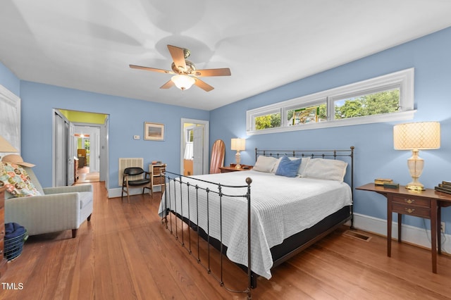 1605 Longview Ave, Tarboro, NC 27886 - bedroom featuring wood finished floors, baseboards, and ceiling fan