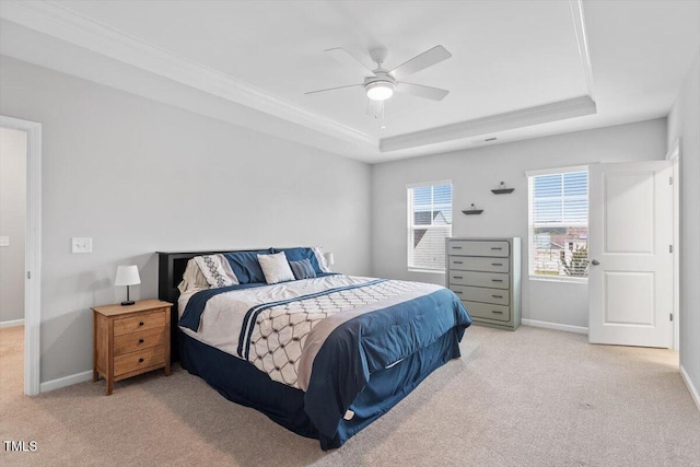 320 Everly Mist Way, Wake Forest, NC 27587 - bedroom featuring a tray ceiling, carpet floors, baseboards, ornamental molding, and a ceiling fan